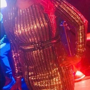 Sequined black and gold party dress with belt